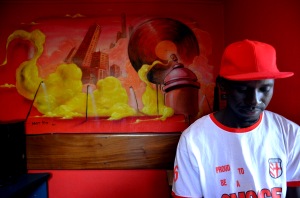 St. Nelly-Sade with monk E.'s painting at Hot 100 radio -Uganda